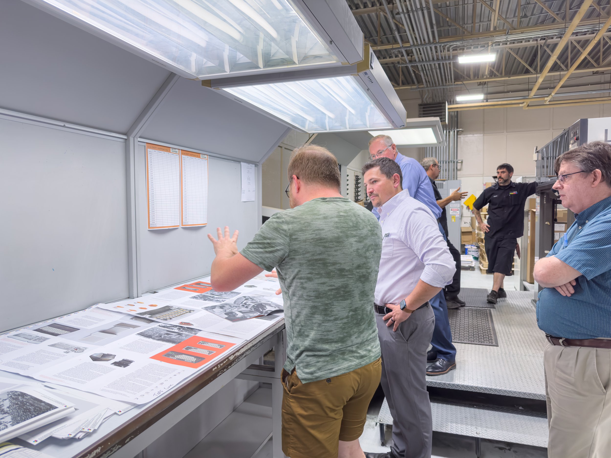 It takes a crew to staff a press and print a book.