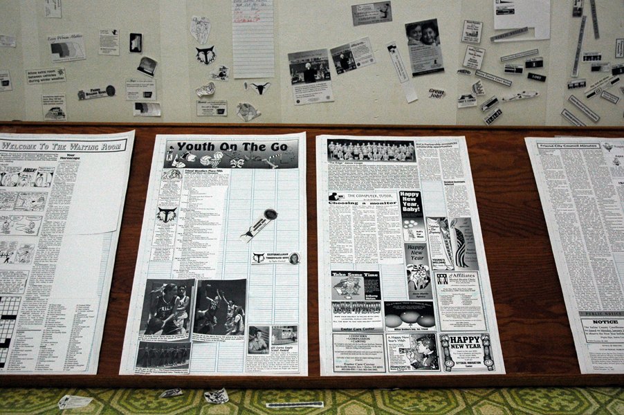  Paste-up boards with mostly complete layouts show how it was done. The boards were printed with a grid in a light blue that isn’t picked up by a negative camera (or stat camera’s) film. Waxed text, headlines, graphics, fully produced ads provided by a company or agency, and other material is assembled. Here, the newspaper is using halftones made as positives, which lets them place the images directly in place but it adds a generation of reproduction—it’s faster and cheaper to assemble but the quality will be worse than stripping in negatives. (Image: limonada, “ old school layout ”) 